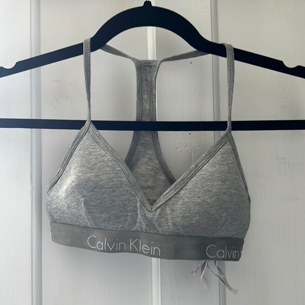 Three small Calvin Klein sports bras. Bought separately but seeking together.